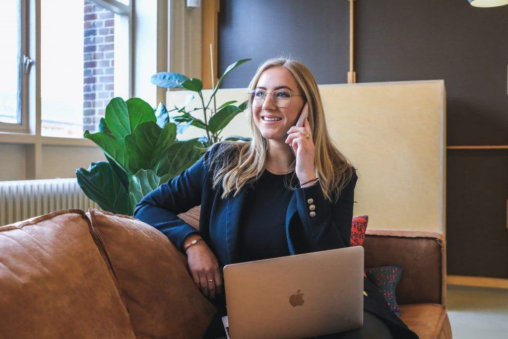 Woman transferring her utilities before moving over the phone